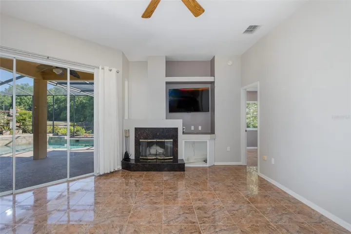 FORMAL FAMILY ROOM WITH FIREPLACE