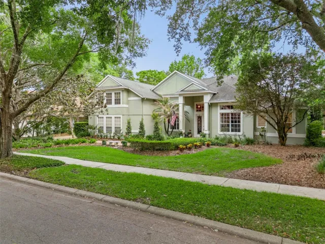 Beautifully landscaped 0.59 acre homesite with stately curb appeal