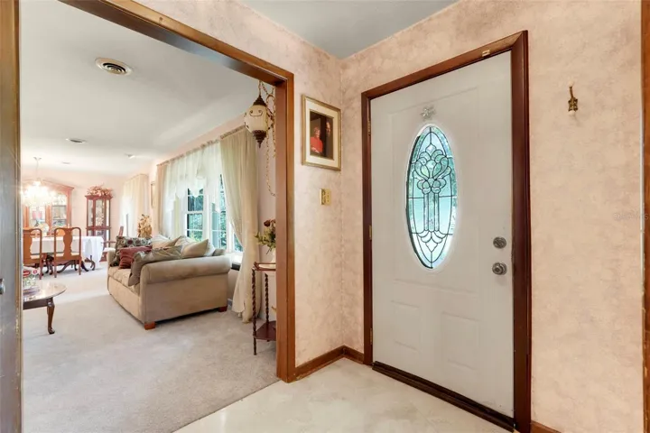 Formal living and dining area just off the foyer entry.