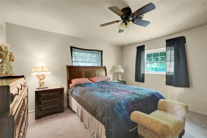 Bedroom 2 offers comfort, functionality, and natural light.