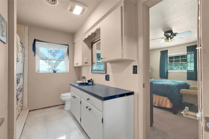Well-positioned hall bath offering direct access from Bedroom 2.
