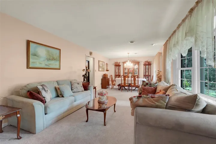 Welcome guests into this bright and spacious formal entertaining space.