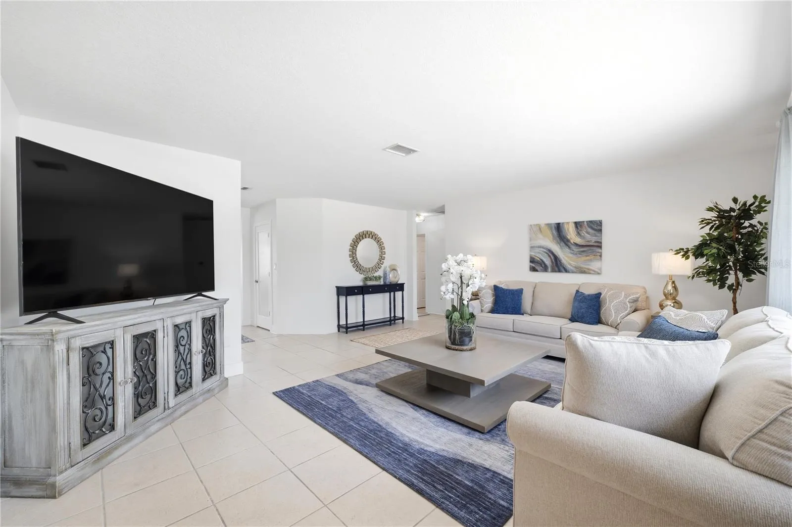 open concept formal living space as you walk in
