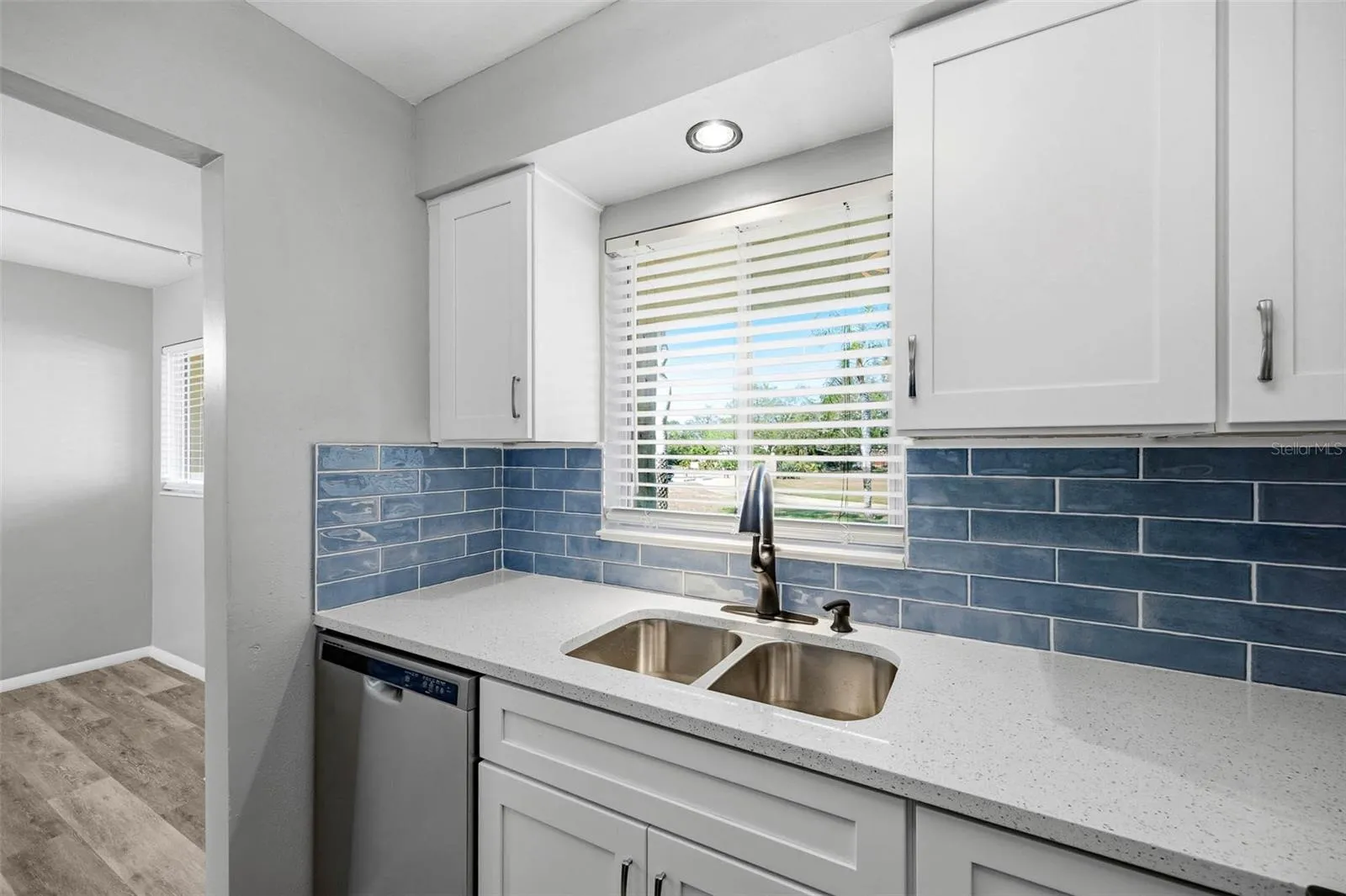 Quartz Counter Tops - Wood Cabinets  - Subway Tile Backsplash