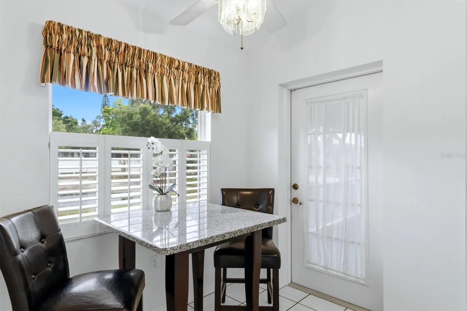 Breakfast nook with French door to lanai