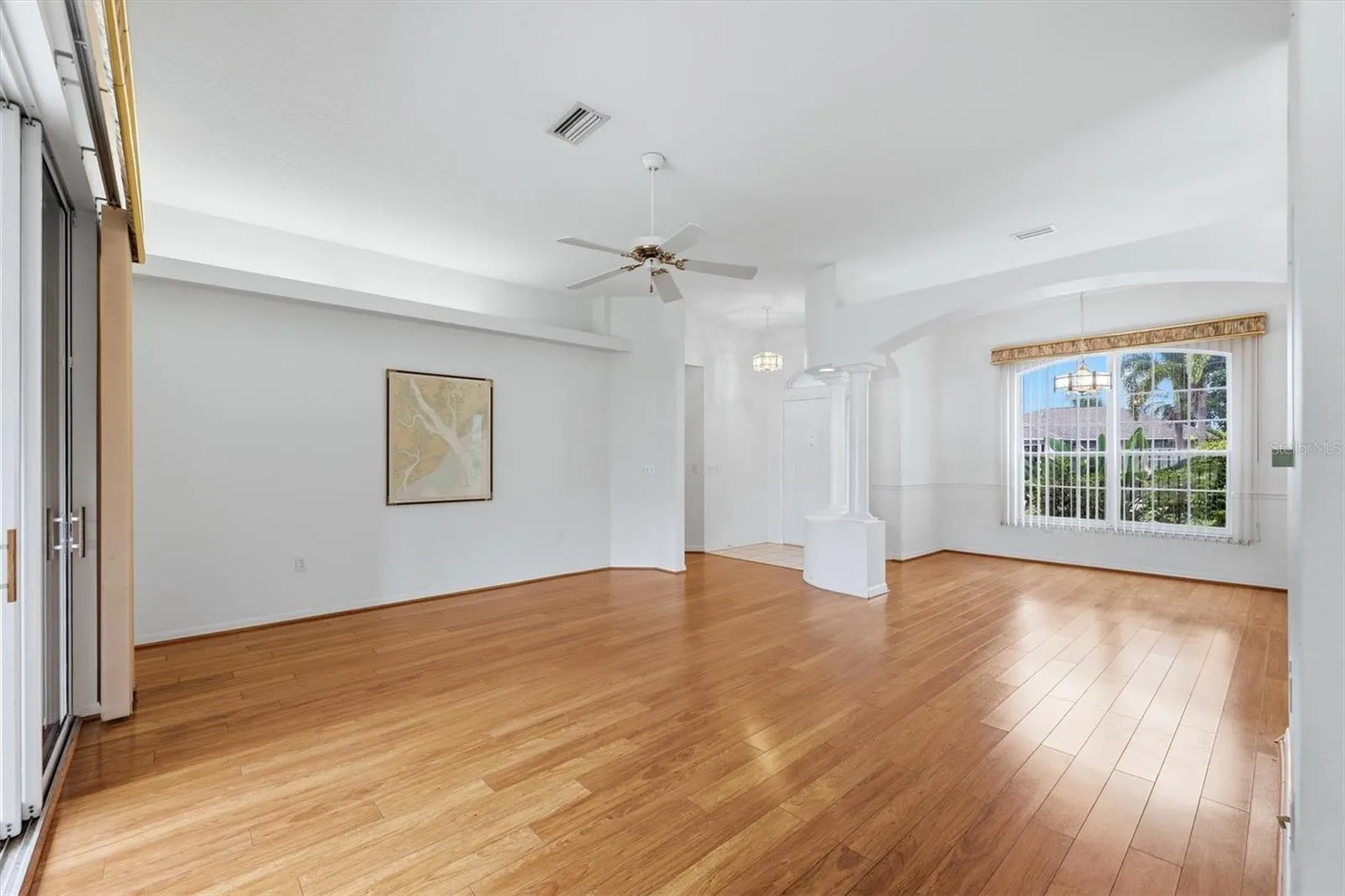 Living/dining room has wood-look laminate flooring