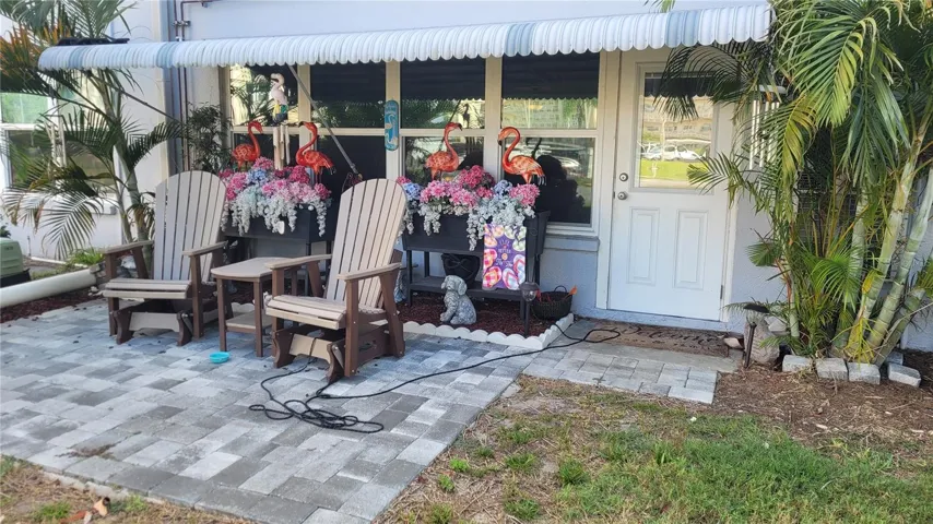 Inviting patio with hurricane awning