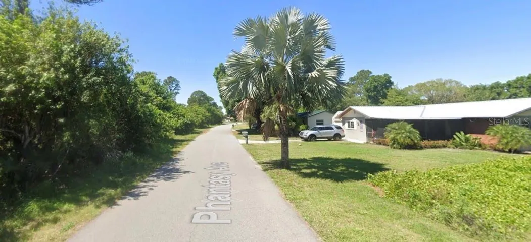 Lot to the left of photo