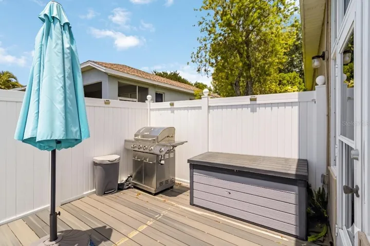 Outdoor grill area beside the deck