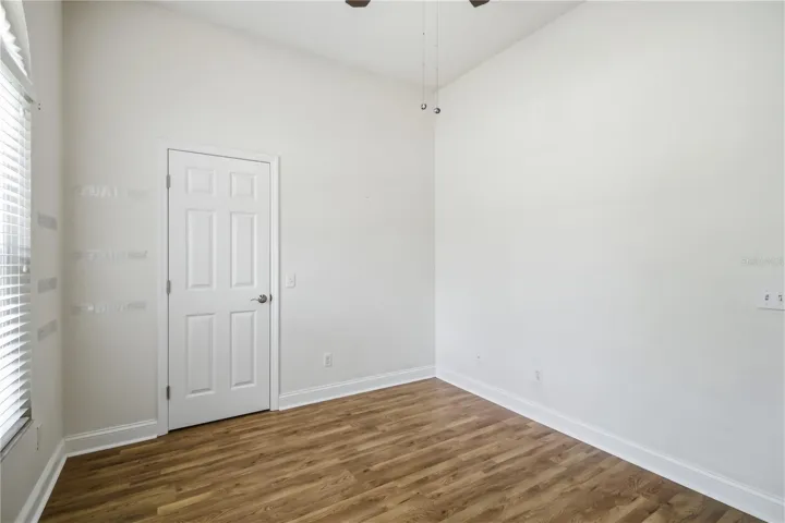 Secondary bedroom with bright neutral finishes