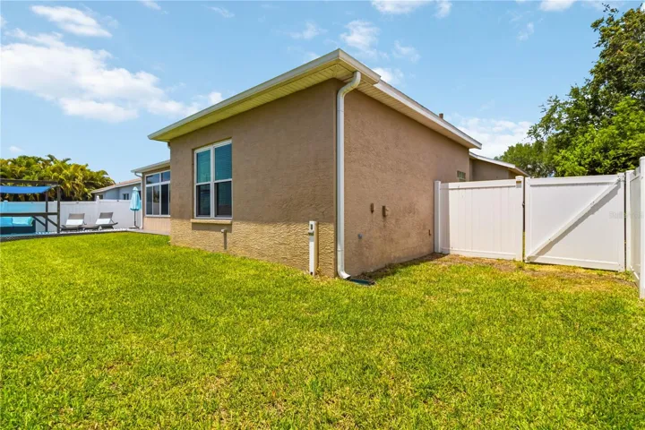 Side yard with vinyl privacy fencing
