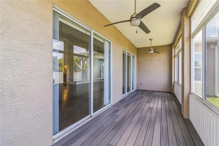 Screened sunroom with deck flooring