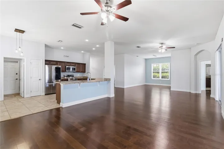 Spacious great room with engineered wood floors