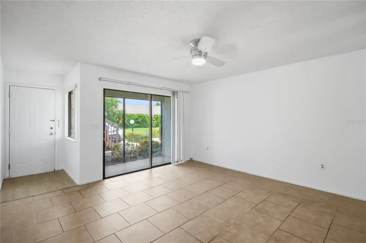Bright living room with tile flooring