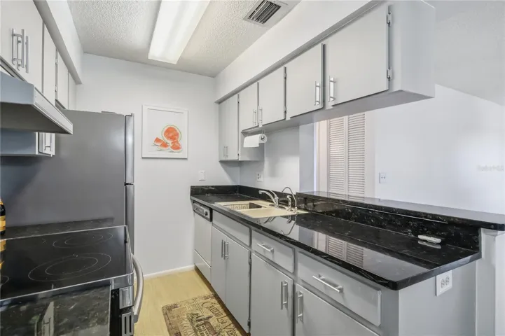 Kitchen with new countertops and updated range