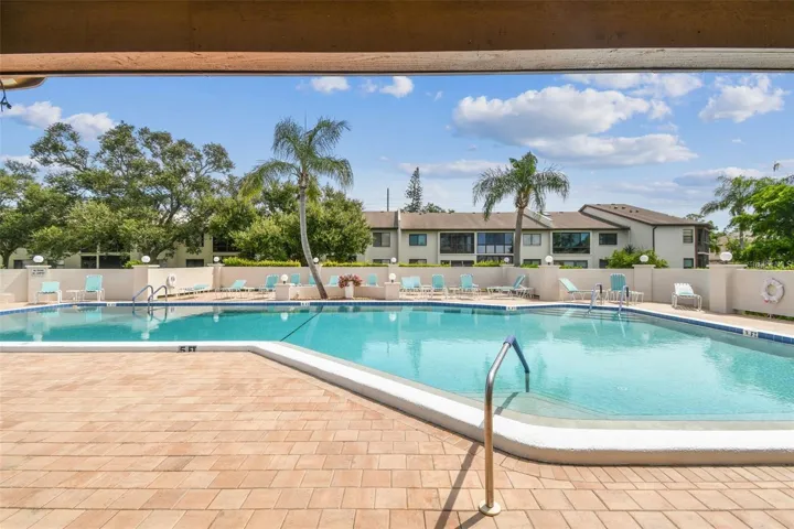 Relaxing pool area with lounge seating