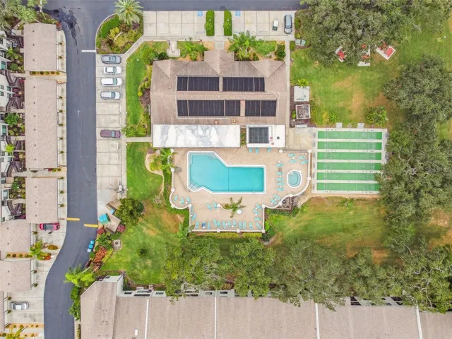 Aerial view of clubhouse, pool, and amenities