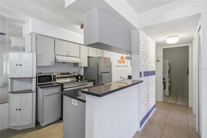 Kitchen layout with pantry and nearby dining