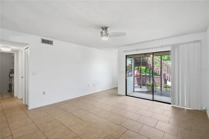 Living room opens to screened lanai