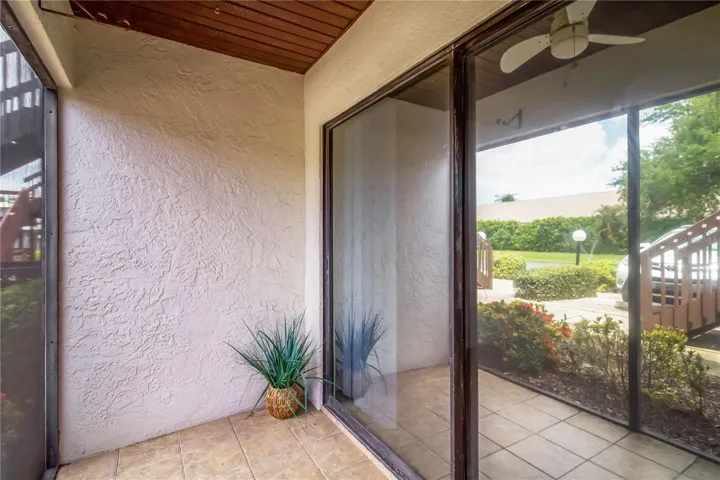 Covered lanai with sliding glass door access