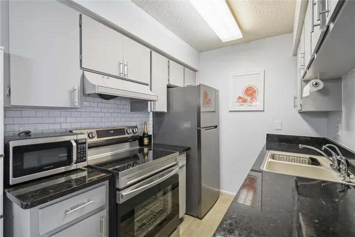 Kitchen with select updated appliances