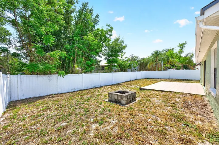Privacy fenced backyard.