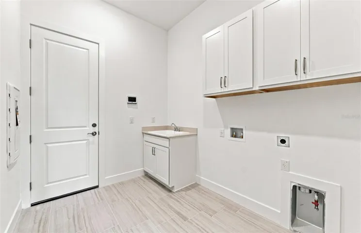 Laundry Room w/Built-in Cabinets