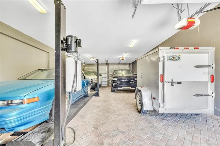 4 car garage with car lift