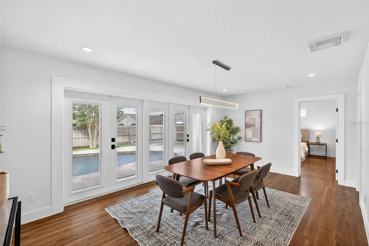 Dining room with double French doors to pool