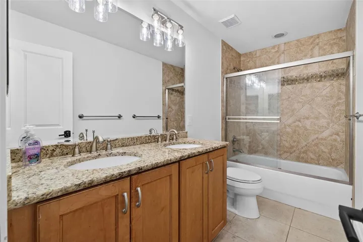 Full hall bath with double sink vanity