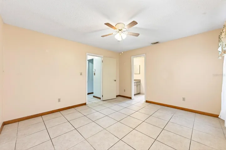 A desirable SPLIT-BEDROOM FLOOR PLAN places the Primary Suite in a private retreat at one end of the home, complete with a walk-in closet and EN SUITE BATH.
