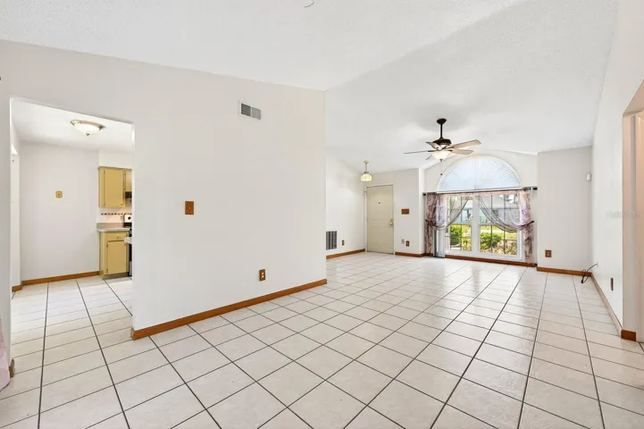 Step inside to the soaring VAULTED CEILINGS in the main living areas, creating an open and inviting atmosphere filled with NATURAL LIGHT.