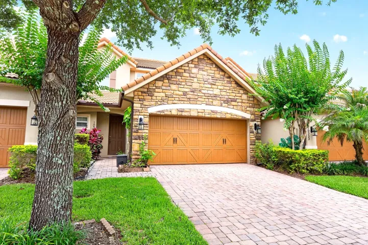 Experience UPSCALE LIVING in the highly sought-after Eagle Creek Golf Community, where luxury, security, and RESORT-STYLE AMENITIES come together in this beautifully maintained 4-bedroom, 3.5-bath townhome offering more than 2,100 SQUARE FEET of thoughtfully designed living space.