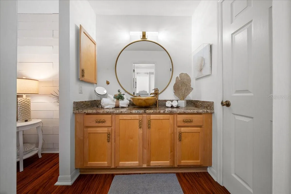 Primary Bathroom Features Granite Countertop
