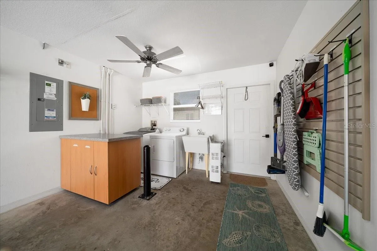 A Place for Everything with Wall Mounted Organizer and Additional Cabinet Space