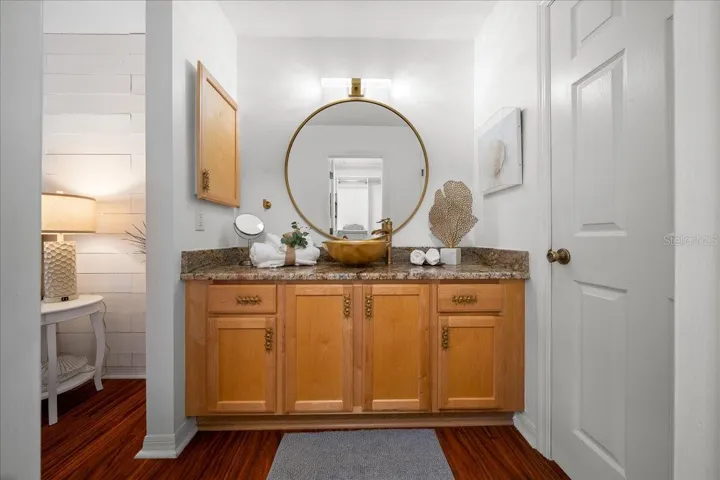 Primary Bathroom Features Granite Countertop