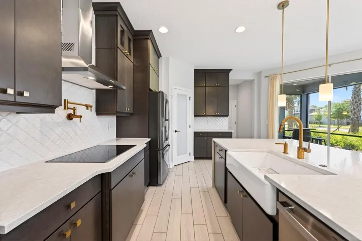 Farmhouse sink and upgraded fixtures, including a pot filler!