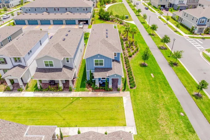 End/corner lot, no side neighbors and landscaped green space.