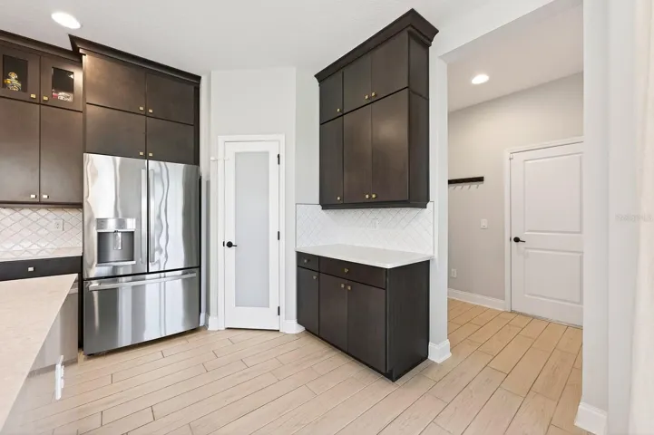 Stainless steel appliances and ample storage.