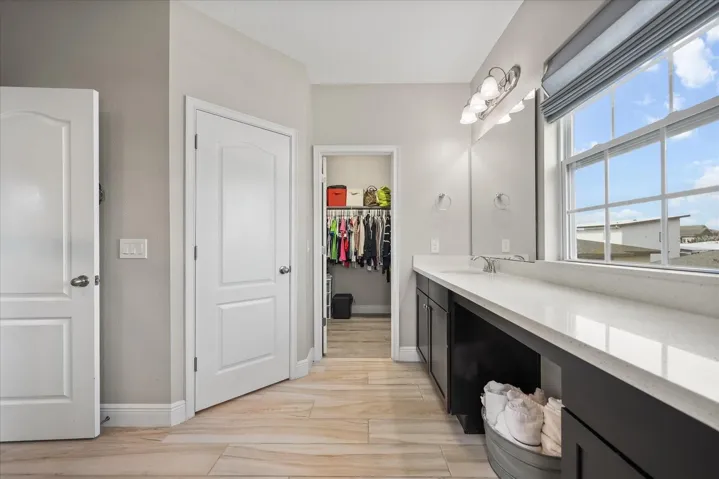 Primary bathroom with walk-in closet