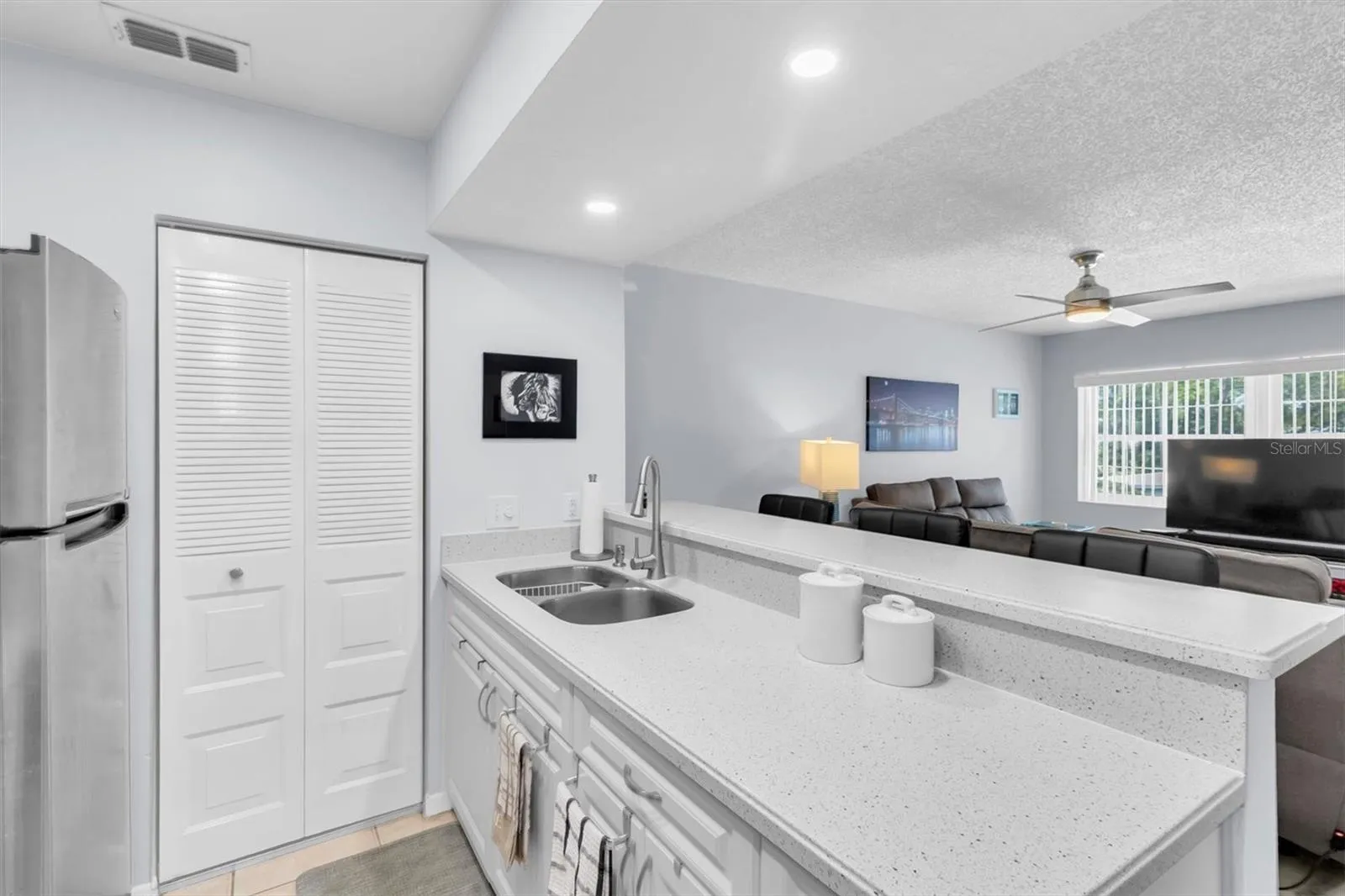 Laundry facilities off of kitchen.
