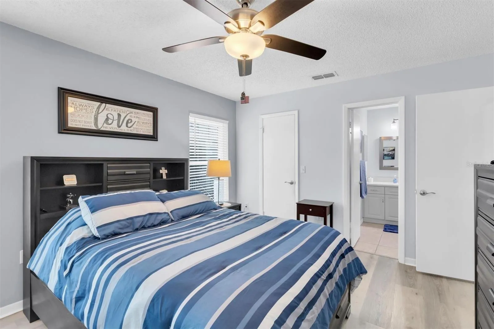 Primary bedroom with walk in closet