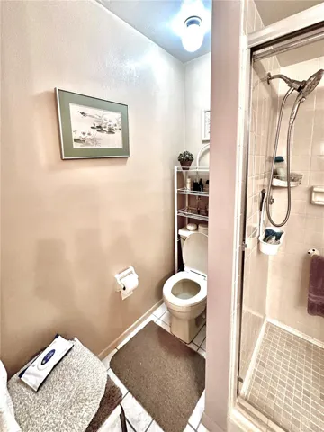 Master bathroom with walk-in shower.