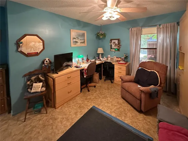 Guest bedroom/office with built in desk.