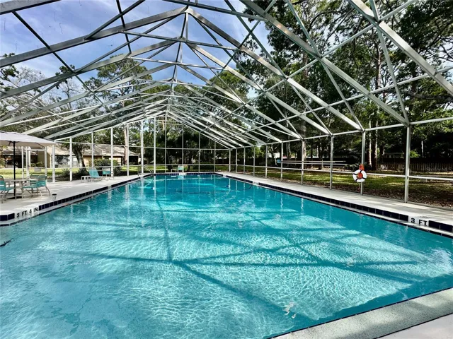 HUGE screened in community pool.