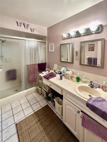 Master bathroom with walk-in shower.