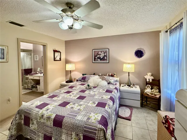 Master bedroom with walk-in closet and on suite full bathroom.