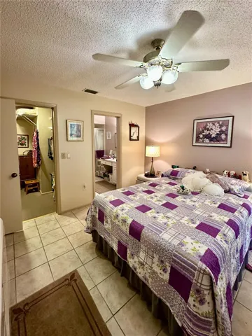 Master bedroom with walk-in closet and on suite full bathroom.