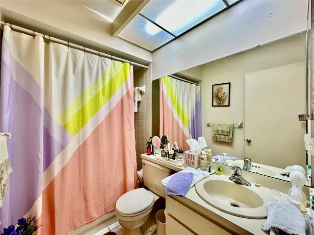 Guest bathroom with tub.