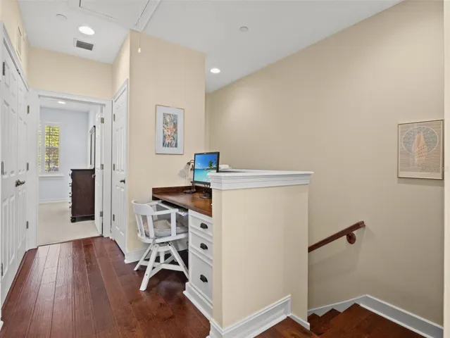 Upstairs loft with built in desk, ideal for workstation or homework/crafts.